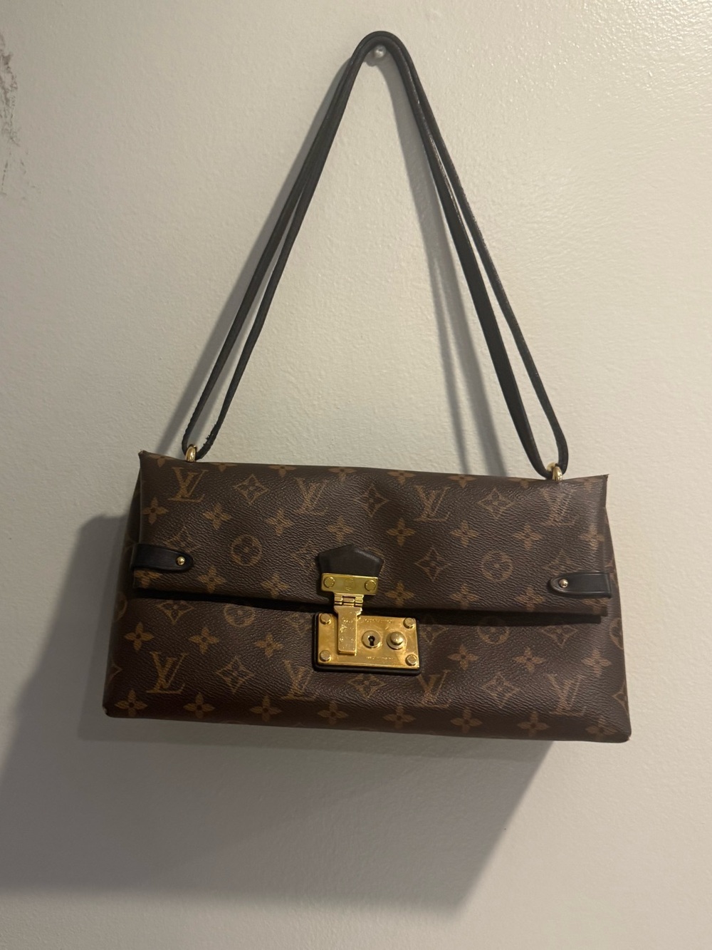 Limited Edition Louis Vuitton monogrammed Sac Trisngle Shoulder bag
